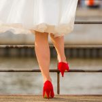 Bride with red shoe on.