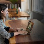 Woman learning languages with an instructor virtually